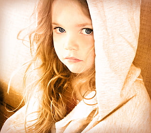 photography of blonde haired girl wearing gray hoodie