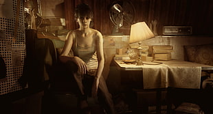 woman in grey camisole sitting near table HD wallpaper