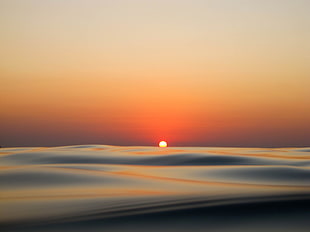 calm ocean during golden hour