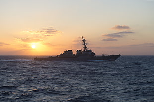 ship at sea under sunset HD wallpaper