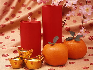 two red pillar candles HD wallpaper