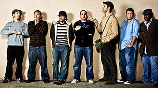 seven men standing