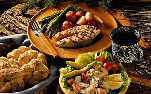 assorted cooked food on table