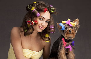 woman beside a Yorkshire Terrier