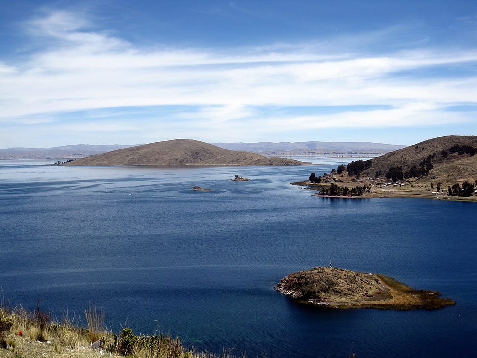 top view of body of water near on brown mountain, bolivia, peru HD wallpaper