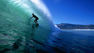 person riding on surfboard over sea wave, surfing, sea, surfers, sports