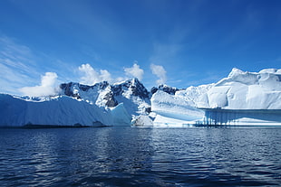 ice berg on sea photo, antarctica