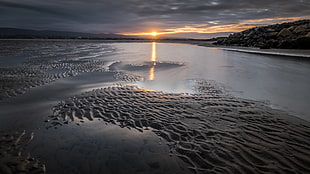landscape photography of body of water during golden hour, sandymount, dublin, ireland