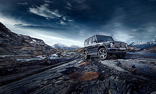 gray Mercedes-Benz G-class on rocky mountain HD wallpaper