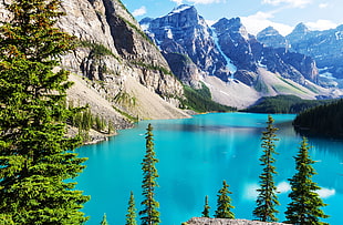 blue lake at the center of mountains HD wallpaper