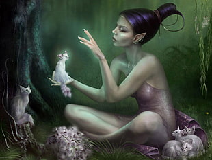 purple dressed woman with white kitten on her hand