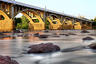 concrete bridge during at daytime, broad river HD wallpaper