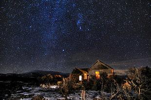 brown house, stars, snow