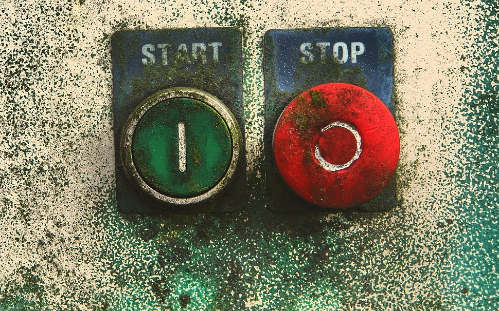 green start and red stop buttons on wall HD wallpaper