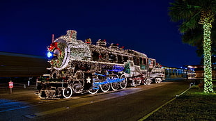photo of train with string lights