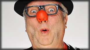 man wearing clown nose
