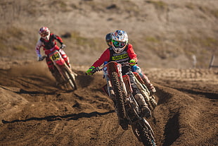 two person wearing enduro helmets riding dirt motorcycles during daytime HD wallpaper