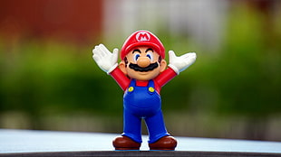 selective focus photography of Super Mario toy