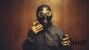 Slipknot member with black mask