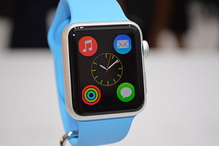 silver aluminum case Apple Watch with blue sports band