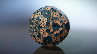 shallow focus photography of blue and white wooden ball