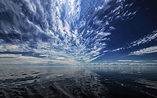 white clouds, water, sky