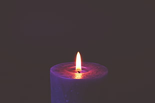 shallow focus photography of white candle