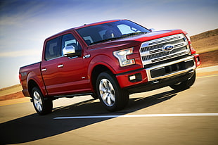 red Ford F-150 crew-cab on road HD wallpaper
