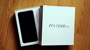 gold and black M1 Note with box