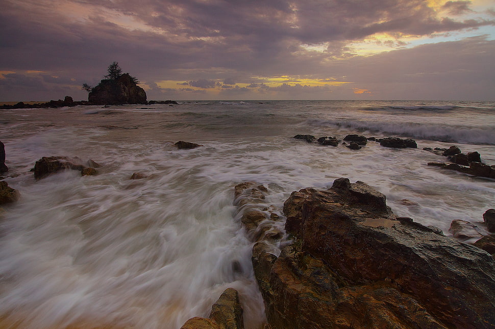 Flowing Water to the Ocean Under Grey Sky HD wallpaper