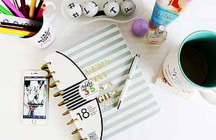 every Day is a gift notebook on table beside container HD wallpaper