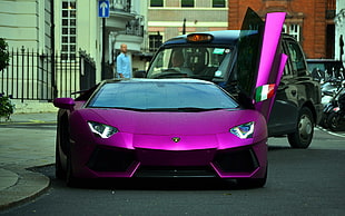 purple Lamborghini Aventador with door opened
