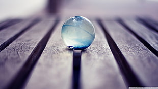 blue toy marble, photography, macro, marble, wood HD wallpaper