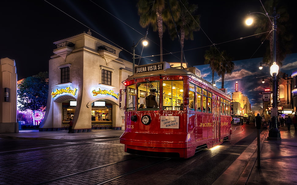 red city tram during nighttime HD wallpaper