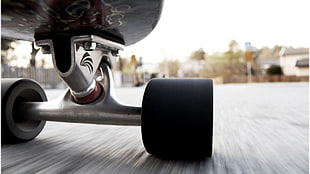 black skateboard wheels, skateboard, simple background