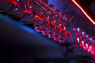 red lighted wine glasses