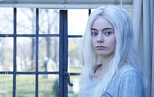 woman with white hair near window panel HD wallpaper
