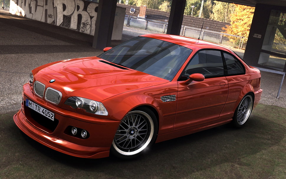 red BMW coupe on gray concrete road HD wallpaper