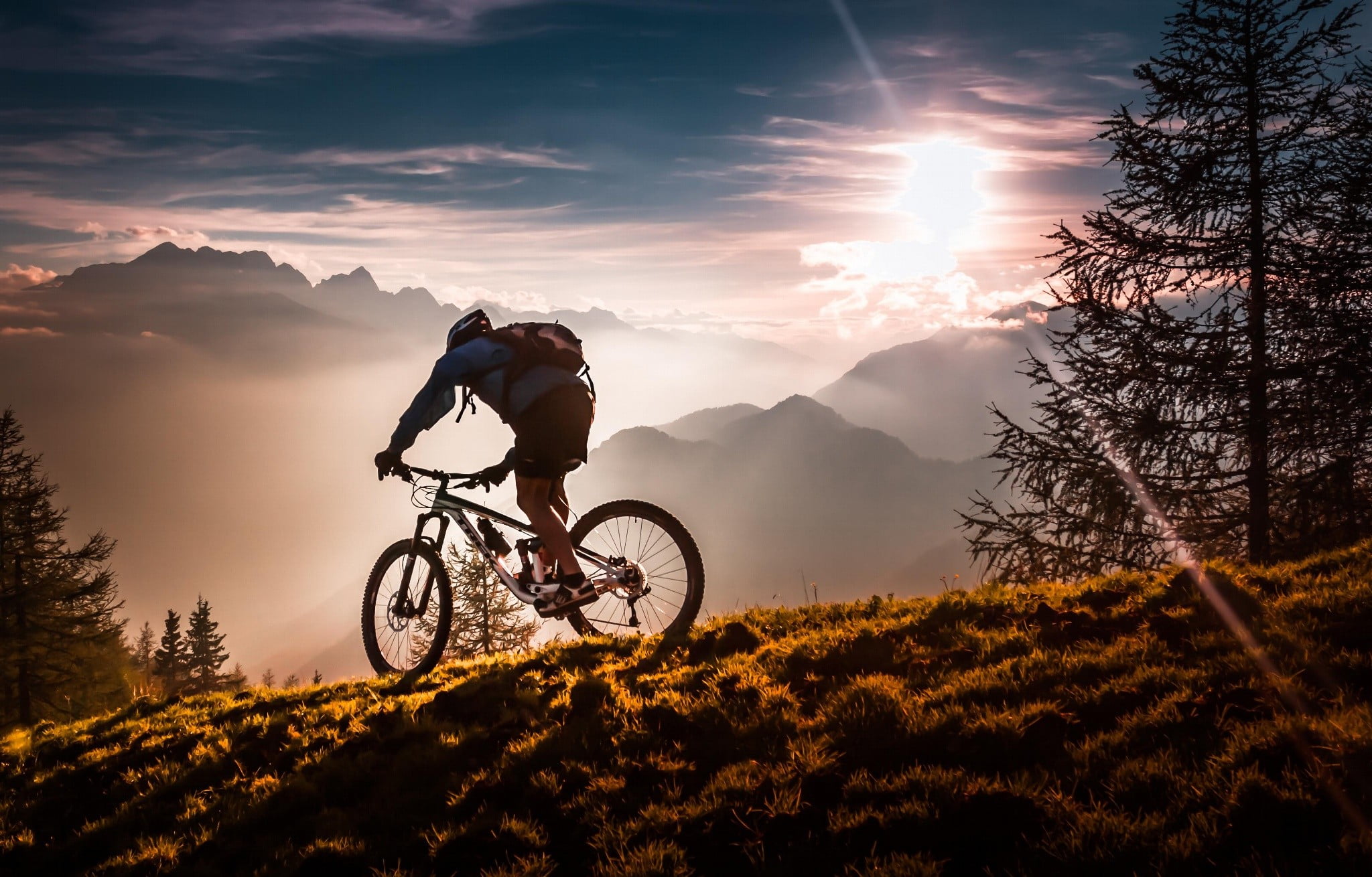Man riding mountain bike under sunset HD wallpaper | Wallpaper Flare