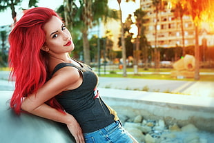 red haired woman in black sleeveless top photography