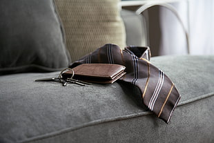 brown leather bi-fold wallet near brown necktie and greykeys HD wallpaper