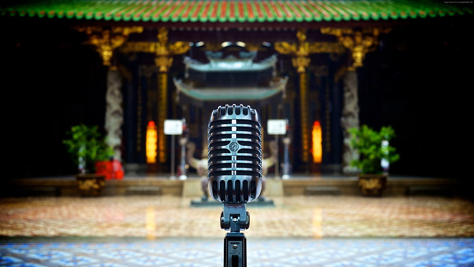 selective focus of condenser microphone facing temple HD wallpaper
