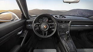 black Porsche steering wheel HD wallpaper