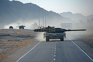 battle tanks on road