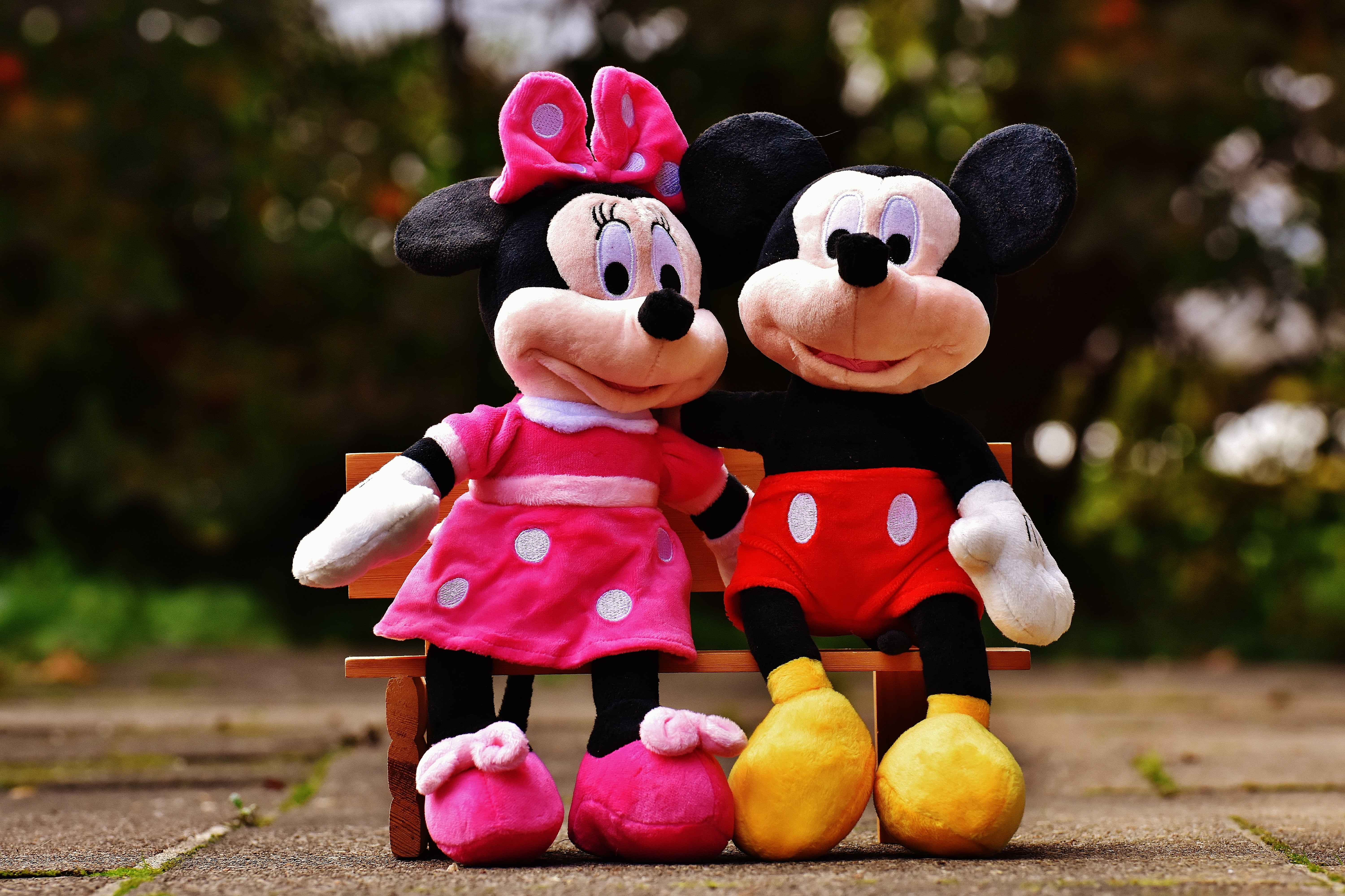 Mickey And Minnie Mouse Plush Toy Sitting On Brown Wooden Bench HD