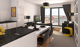 white wooden kitchen counter and black marble top apartment interior
