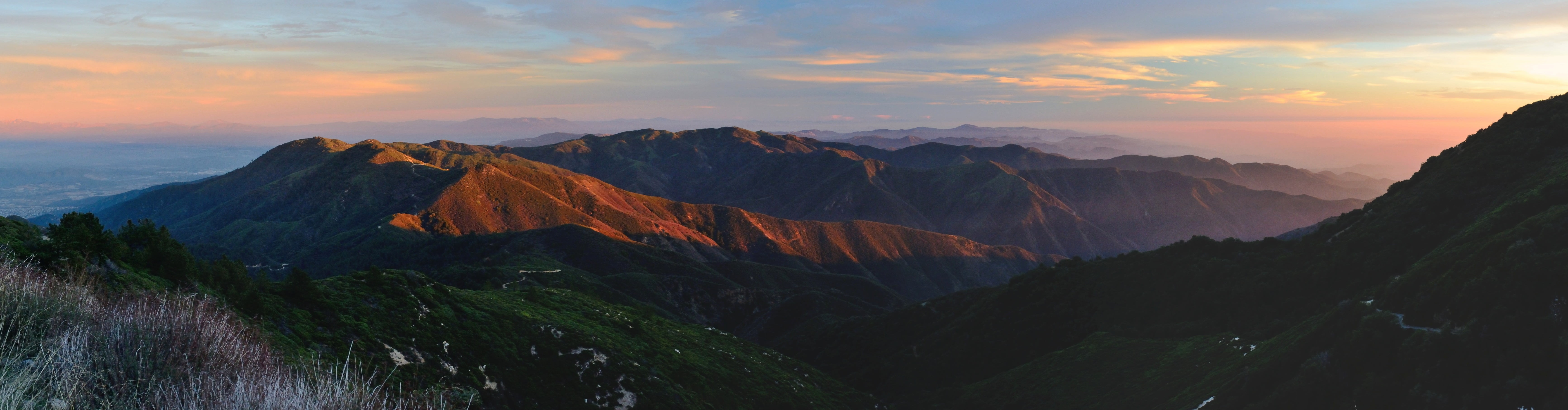 landscape photography of brown mountains under cloudy sky during golden hour, santiago peak