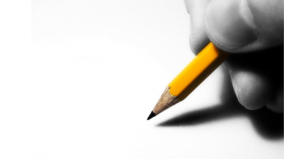 selective color photography of person hand holding pencil HD wallpaper