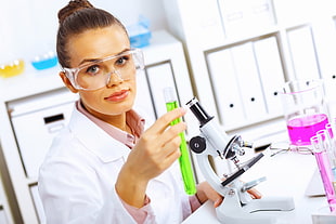 scientist using microscope HD wallpaper