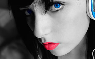 selective color photography of woman with red lips